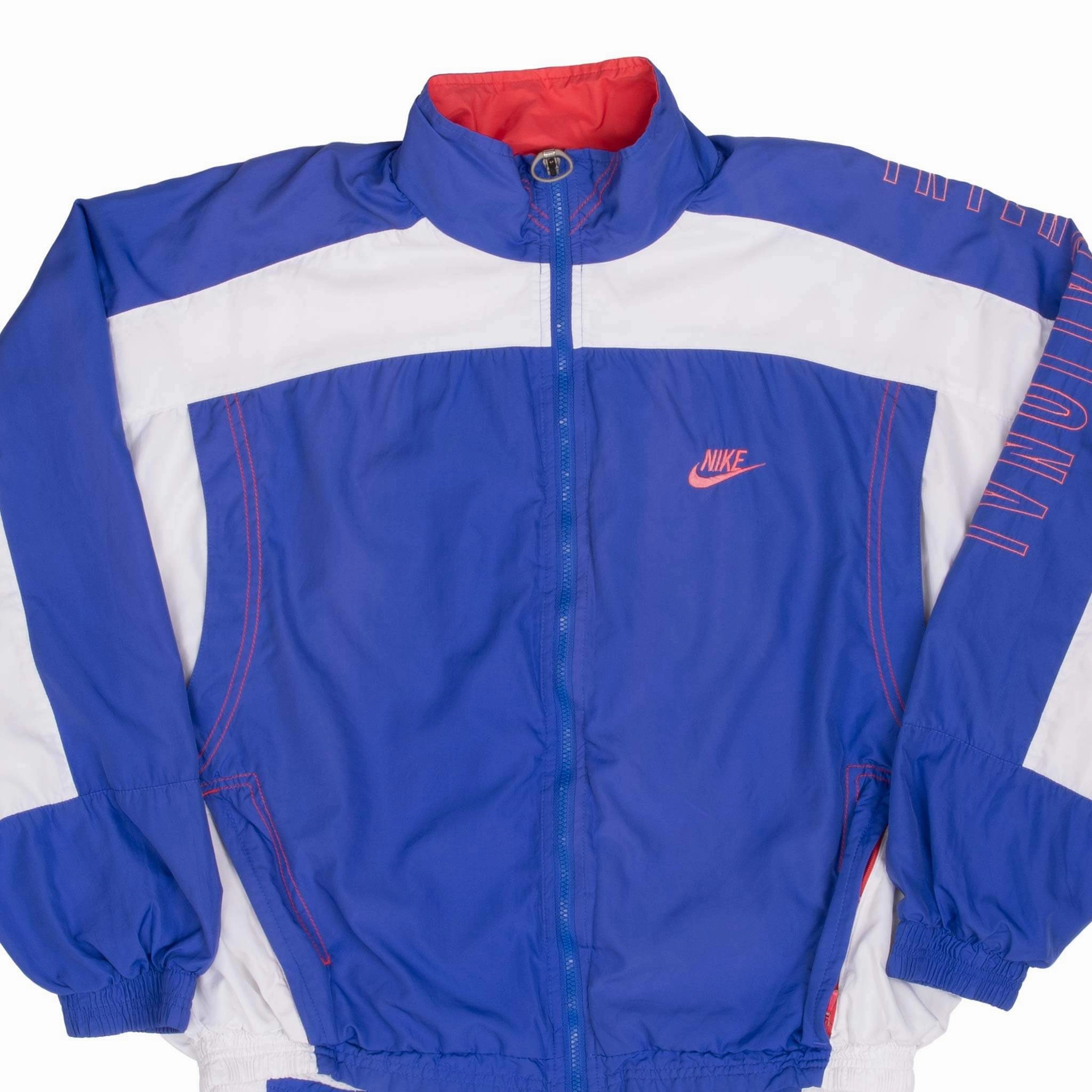 Benchmark VINTAGE NIKE INTERNATIONAL PURPLE WINDBREAKER JACKET 1990S SIZE MEDIUM